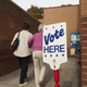 People enter Cotswold School in Charlotte, N.C., to vote Nov. 4, 2014. North Carolina’s voting-rights law goes on trial July 13, 2015.
Davis Turner/Getty Images